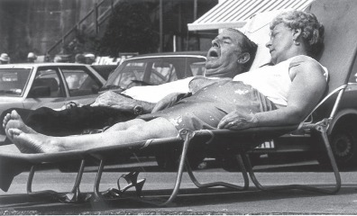 Snooze - a couple enjoy a catnap on Southend seafront in July 1986