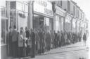 Scramble - customers queuing outside the Southend-based Baldwins Bakery in August 1977