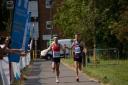 Winners - Shane Boxall (left) and David Smale run down the home straight of the Southend Half