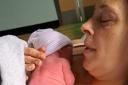 Precious - Toni Brown, 42, of Stansted Mountfitchet, with her newborn son Theo