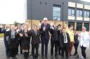 Celebrations - Headteacher and pupils outside the new block