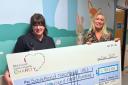 Donation - Emma Cox with Laura Miller, head of nursing for neonatal