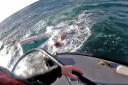 The fishing vessel crew swam to the lifeboat when their boat sank (RNLI Oban HelmetCam/PA)