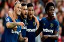 Celebrate - Marko Arnautovic, far left, is congratulated by his team-mates after putting West Ham United in front