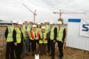 Work begins – headteacher Gill Thomas, holding the spade, with dignitaries