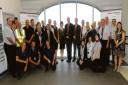 High praise – Employment Minister Chris Grayling, centre, with airport staff