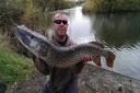 Close call — Andrew Bridge with his new personal best pike which was caught five feet from the bank