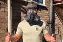 Eye-catching headgear - Paul Rowden is taking on a fundraiser while wearing a gas mask