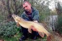 Whopper – Lewis Clark with his pike caught at Doggetts over the weekend
