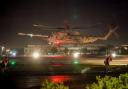 A helicopter carrying Israeli hostages released by Hamas lands at the Sheba Medical Center in Ramat Gan, Israel (Leo Correa, AP)
