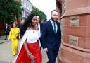 Councillor Lilian Seenoi-Barr (left) arrives with SDLP Leader Colum Eastwood, at the Guildhall in Derry City, before becoming the new mayor of Derry City and Strabane District Council, and Northern Ireland’s first black mayor (Liam McBurney/PA)
