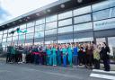 Hospital director and clinical director cut the ribbon with the rest of the team as the new £16 million Basildon animal hospital opens