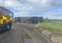 Fire service issues update after coach overturns on major south Essex road