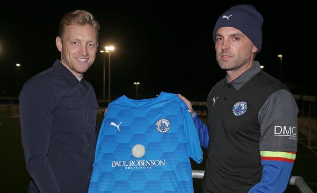 Linking up - Josh Wright (left) is welcomed to Billericay Town by manager Jody Brown Picture: NICKY HAYES