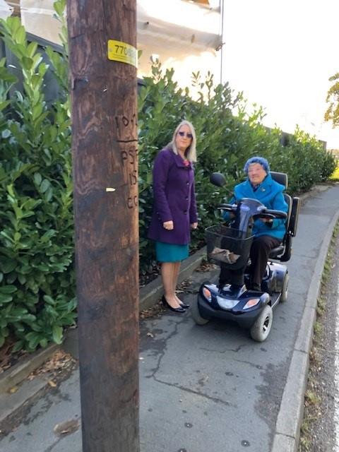 Blocked - councillor Julie Gooding and resident by the telegraph pole