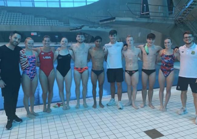 Tyler Humphreys with divers and Matty Lee