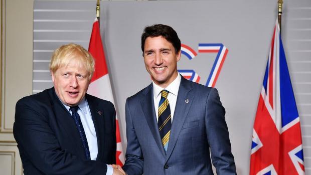 Echo: Boris Johnson and Justin Trudeau (PA)