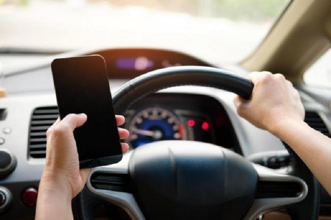 Driver facing disqualification in court after using mobile at the wheel