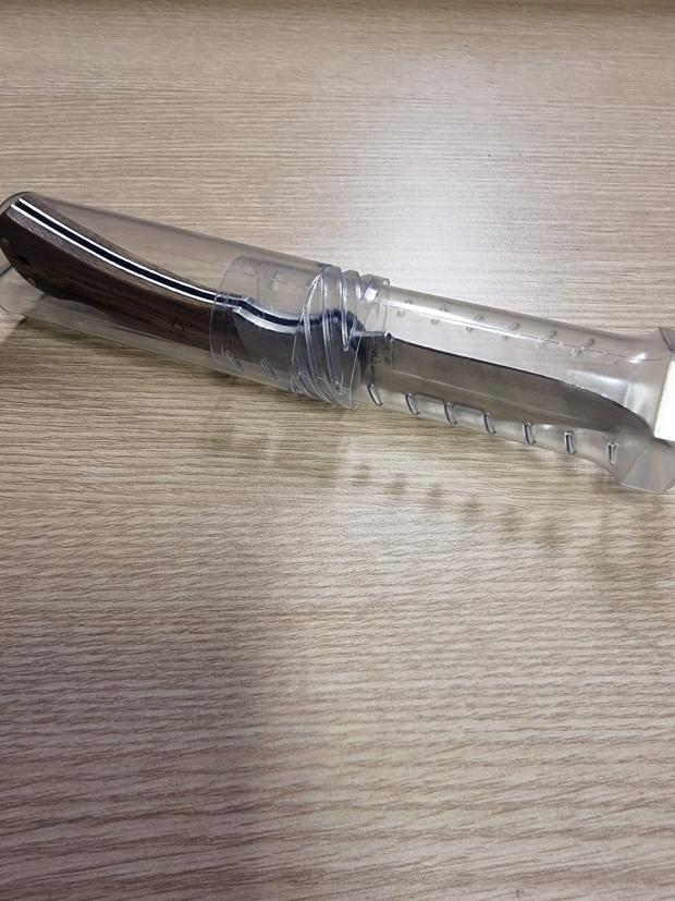 Echo: A lock knife was found on another man after the house search