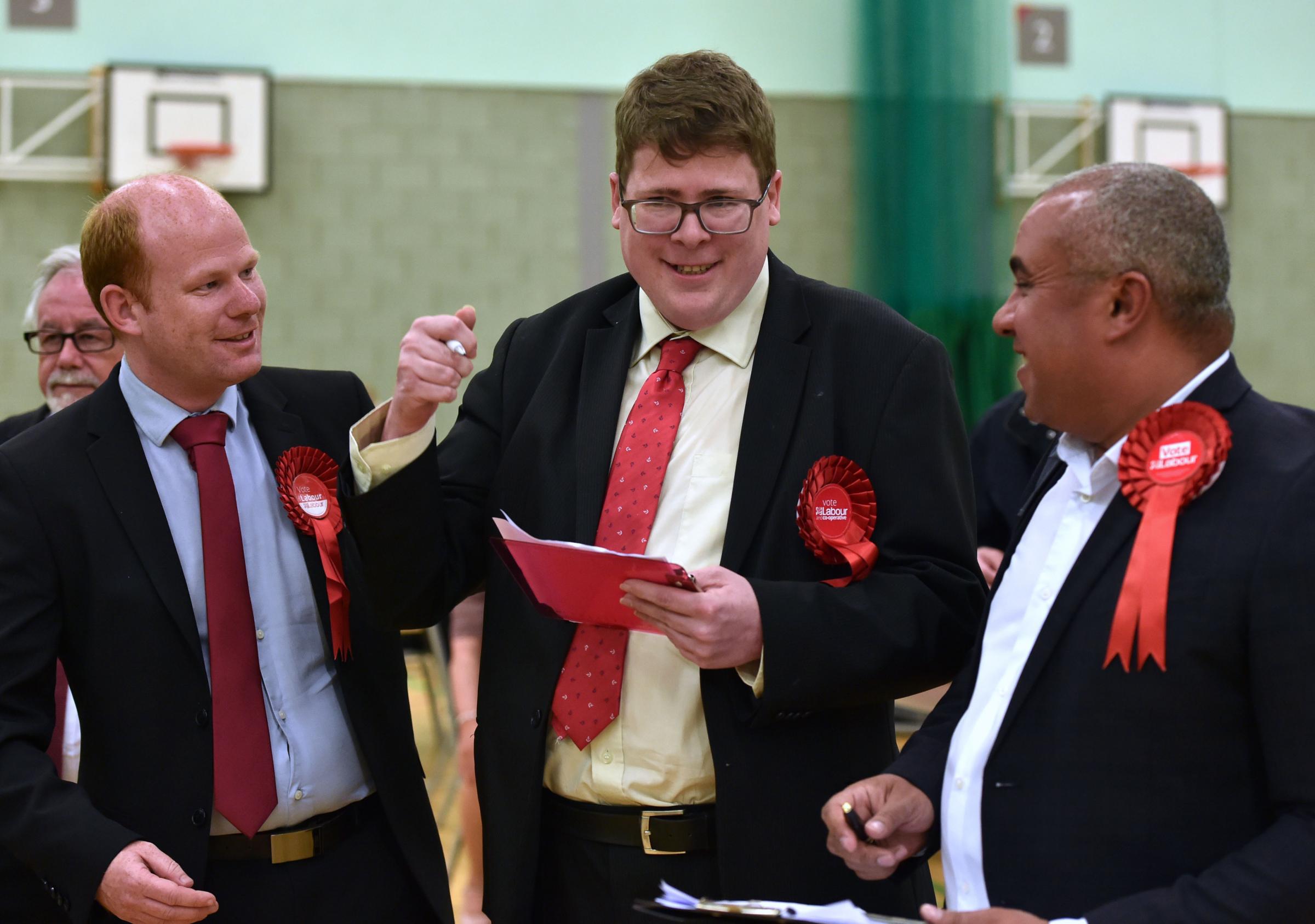 Labour candidate David Kirkman (centre) reacts after taking the Fryerns Ward. Pic: PA