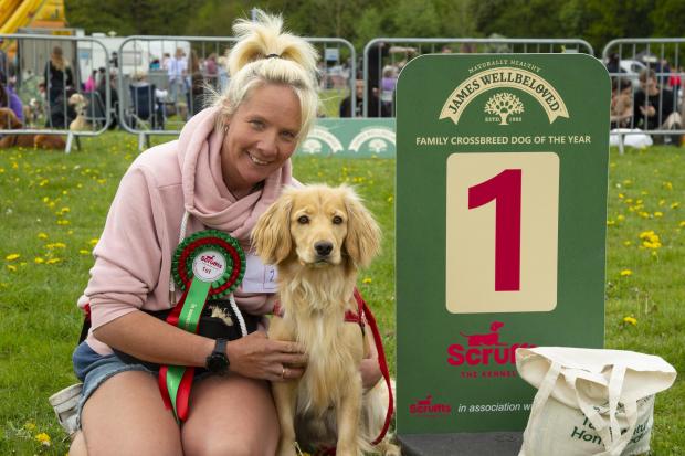 Nicole Crockford with winner Benji. Credit: Credit Dan Towers and The Kennel Club.