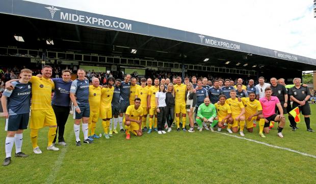 Echo: All together - the two teams and the Barker family at Roots Hall 