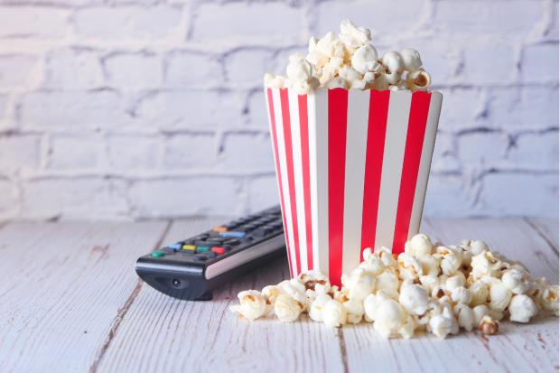 Echo: Popcorn and a TV remote (Canva)