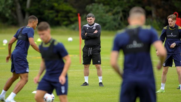 Echo: Taking notes - Boss Kevin Maher keeping an eye on the players during their pre-season training, credit: SUFC/Whitby-Boot