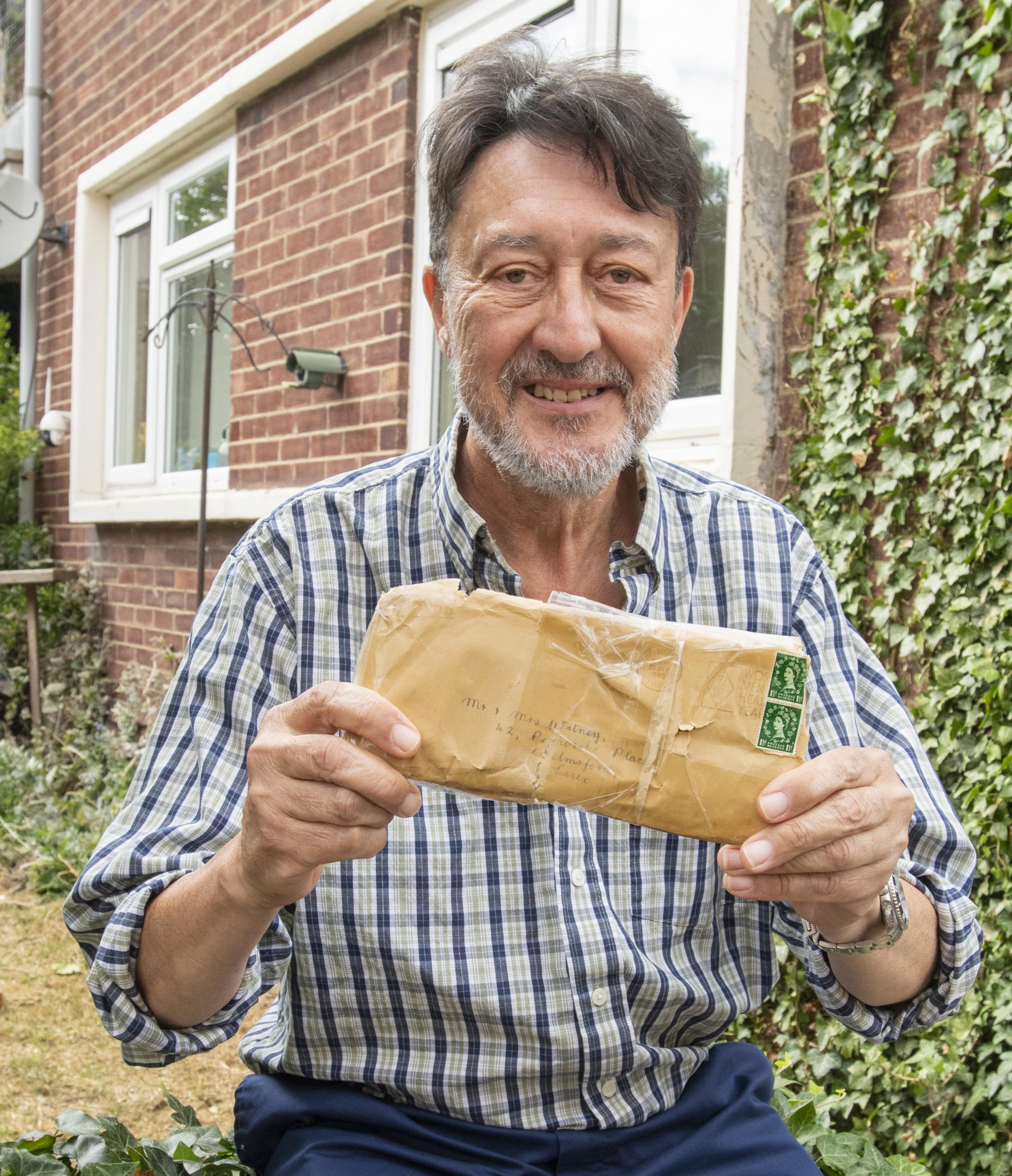 Philip Witney is pictured outside the house he grew up in that the package arrived at 62 years later. Philip will now post the package to his sister Madeline Witney now 72 and living in California, USA. 