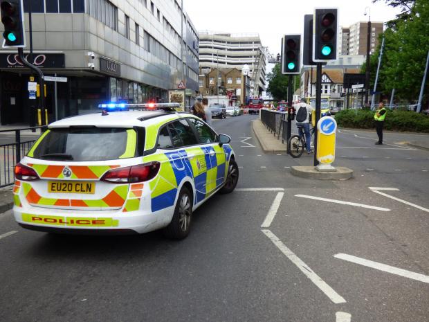 Echo: Police on the scene at Chichester Road. Photo: Aaron Chesham