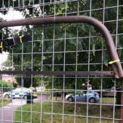 'Abstract art' - including bow saw - found hanging on fence at children's park