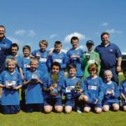 Pride — Forest Glade U11s show off their winners trophy for beating Concord Rangers