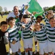 Super hoops - Catholic United Lions with the under 10 Lions Cup