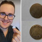 Happy - Oliver Evans with his coin