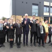 Celebrations - Headteacher and pupils outside the new block