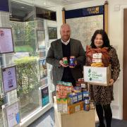 Paul Wood, Hilbery Chaplin Laindon branch manager, accepts donation.