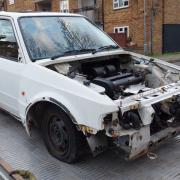 PHOTOS: 'High-value' classic car found stripped of its parts in south Essex car park