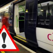 Delays - an image of a c2c train and a warning sign