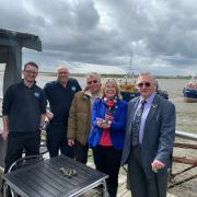 Trial - Southend West MP Anna Firth shows off Manila clams with Dom Bailey and Will Wright from KEIFCA, fisherman Paul Gilson, and city councillor John Lamb