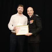 Commended - Sam Hogwood with his commendation from Chief Fire Officer Rick Hylton