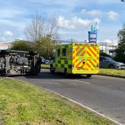 Man rushed to hospital after car overturns in road near Basildon retail park