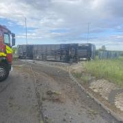 Fire service issues update after coach overturns on major south Essex road