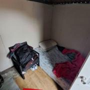 A shed with sleeping arrangements was found at the back of the restaurant