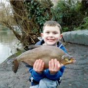 Sweet breams – Jamie Benjamin with a 5lb bream caught by his dad, Dave, at Rochford Reservoir