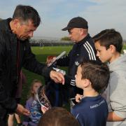 Phil Brown signs autographs for the Junior Blues
