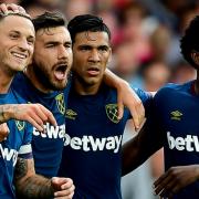 Celebrate - Marko Arnautovic, far left, is congratulated by his team-mates after putting West Ham United in front