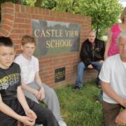 Flu worry – Luke Stephens and Harry Long, both 13, are classmates of Joe Bland, who caught swine flu in Mexico. Also pictured are  parents Neil Perrin, and Tracy Long and Luke’s grandfather, Raymond Billing