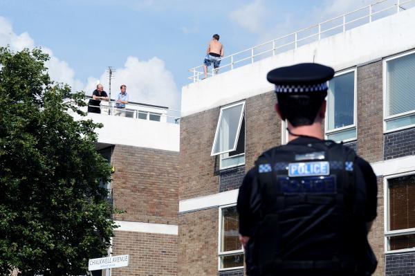 Rooftop 'jumper' blasts police's 'waste of time'