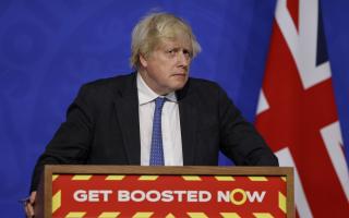 Photo of Boris Johnson as he pushes the Government's Get Boosted Now campaign in light of Omicron. Photo via PA.