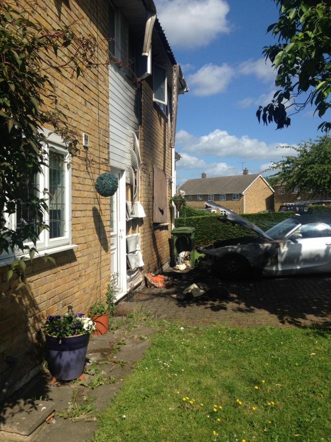 Two dogs rescued after car fire spreads to house in Basildon